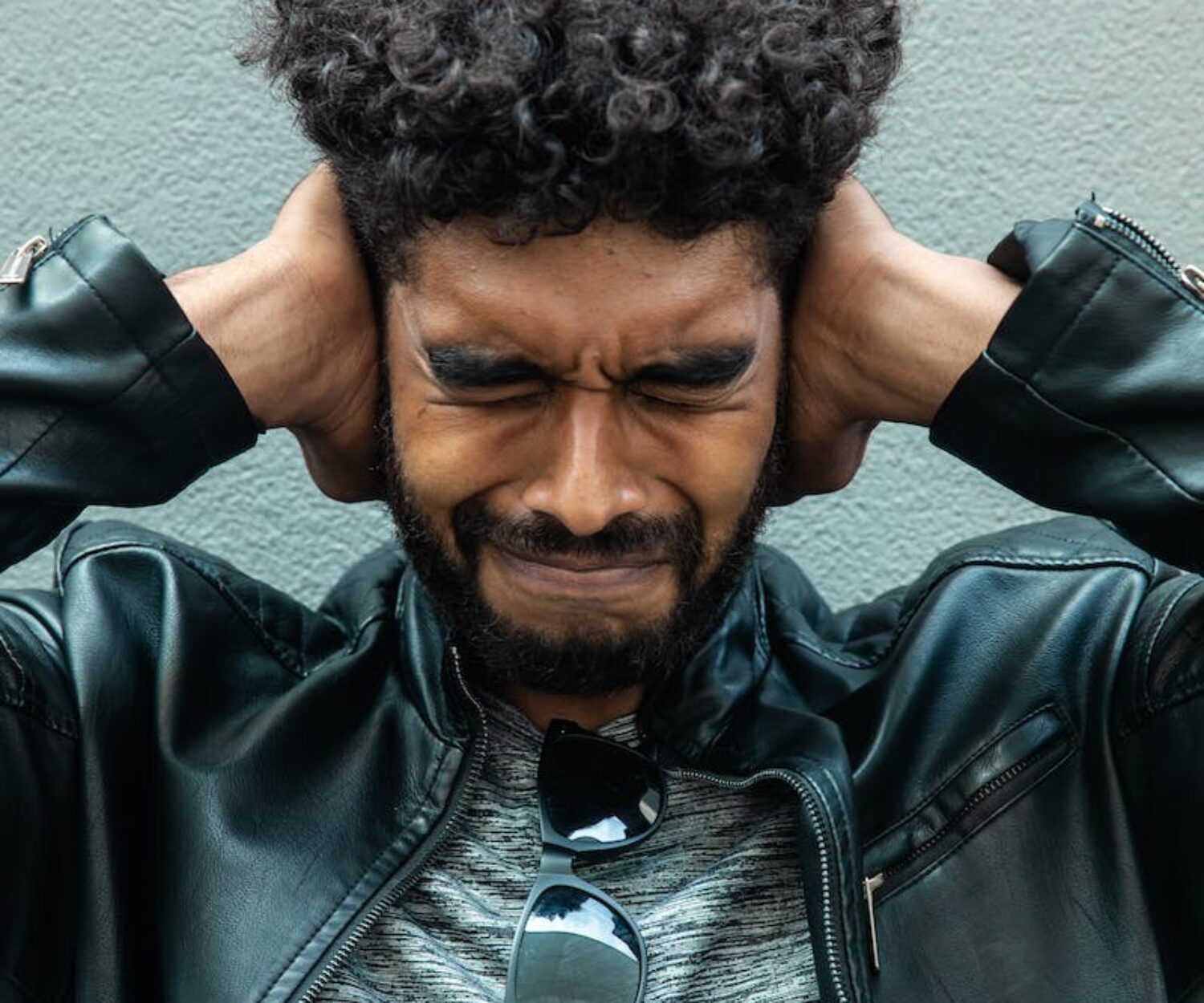 Man in Black Leather Jacket Feeling Annoyed